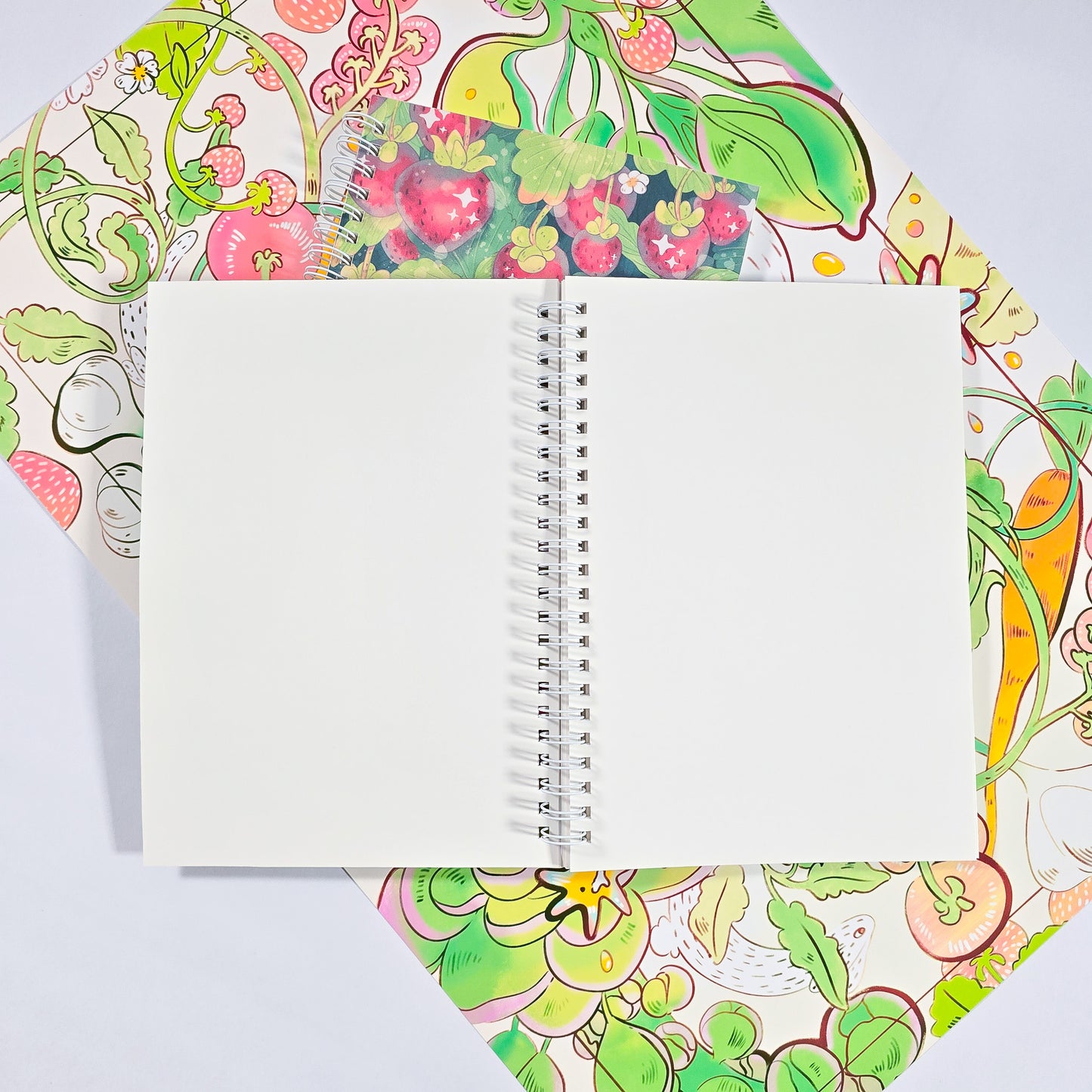 Reusable sticker book with strawberry field cover