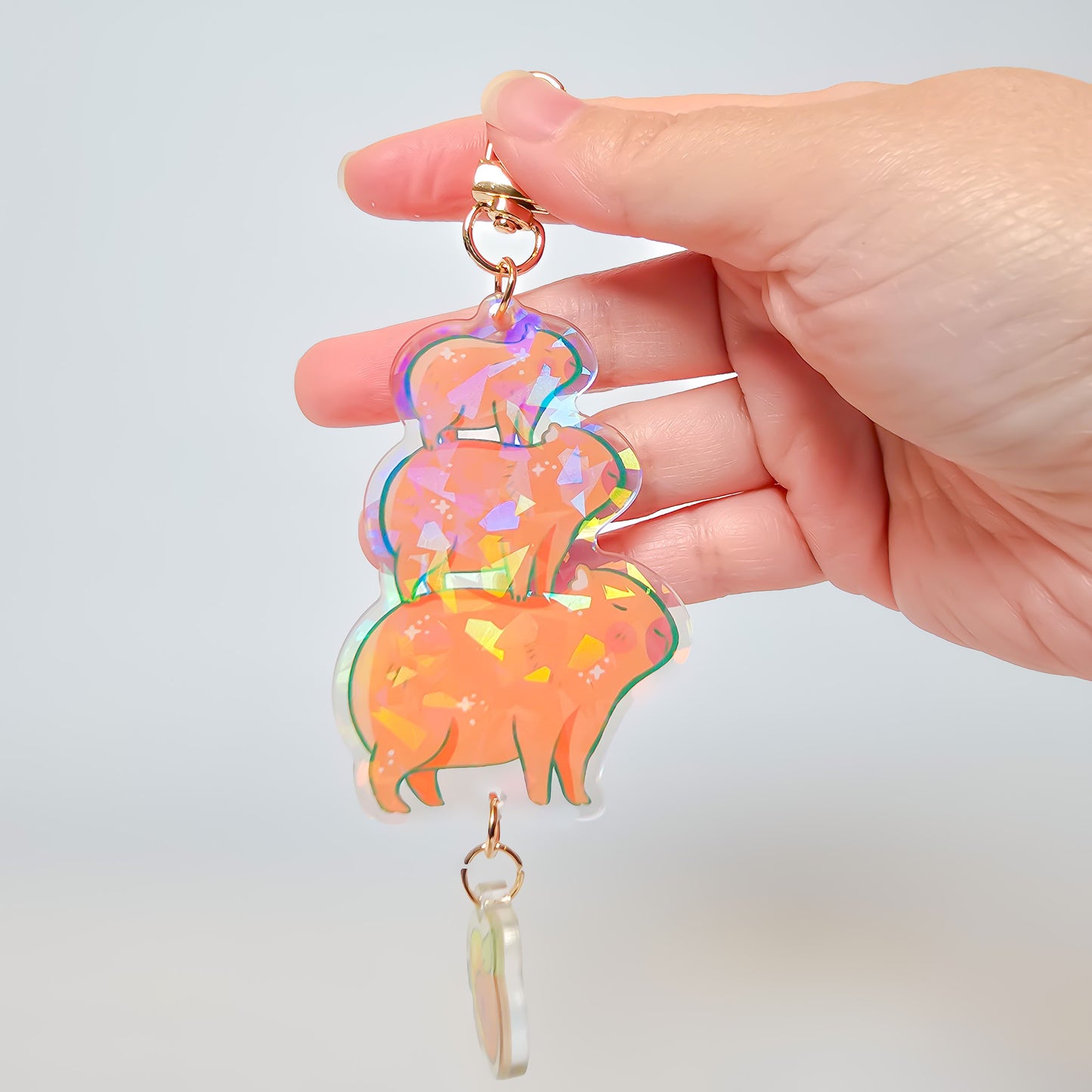 Holographic stacked capybara keycharm