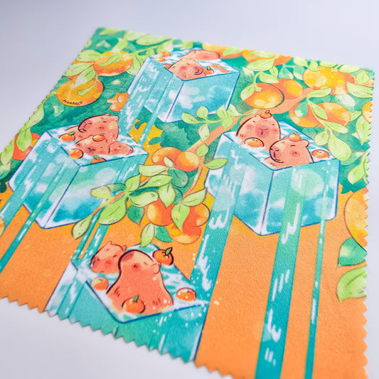 Capybara in orange field microfiber lens cloth